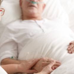 Wife caring about dying spouse